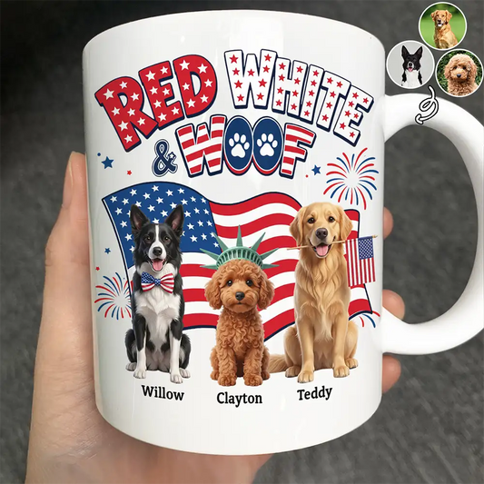 Hand holding a personalized Red White and Woof mug with three dogs and an American flag