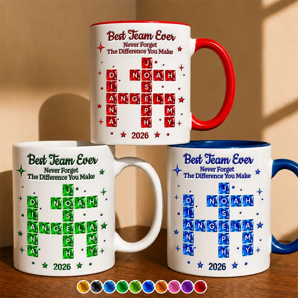 Three personalized Best Team Ever crossword name mugs in red, green and blue