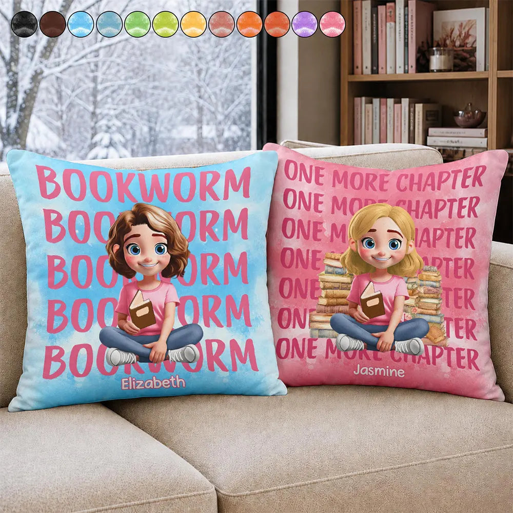 Two personalized book lover throw pillows with cartoon girls reading on a sofa